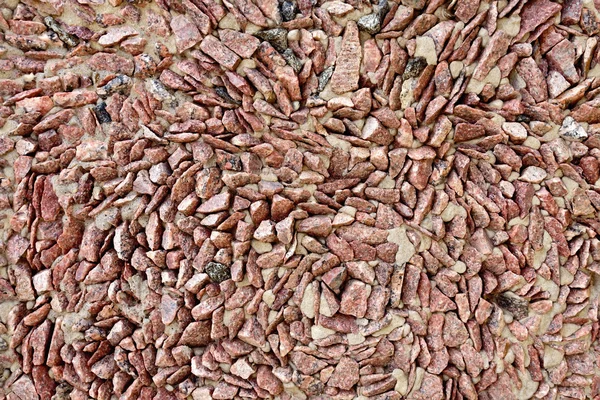 Wall of brown granite gravel — Stock Photo, Image