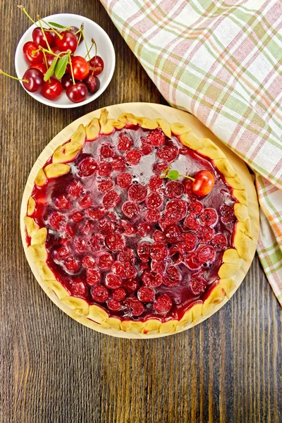 Tart cherry with berries on board top — Stock Photo, Image