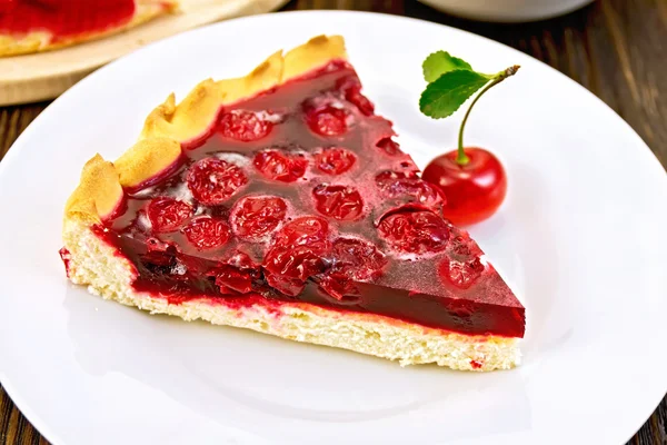 Tart cherry with jelly on board — Stock Photo, Image