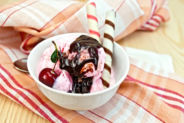 Ice cream cherry with chocolate syrup and waffles — Stock Photo, Image