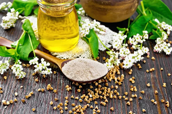 Buckwheat Flour Brown Cereals Spoon Oil Glass Jar Burlap Flowers — 图库照片