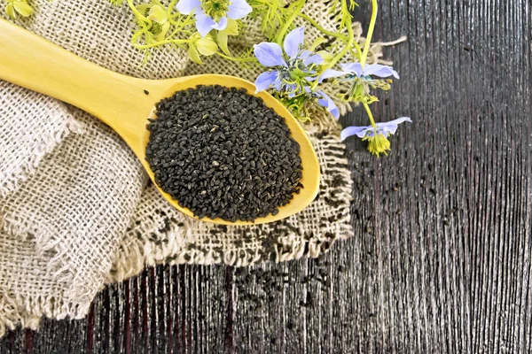 Black Cumin Seeds Spoon Sacking Kalingi Twigs Blue Flowers Green — Stock Photo, Image