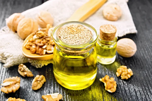 Walnut Oil Jar Bottle Nuts Spoon Table Burlap Napkin Wooden — Stock Photo, Image