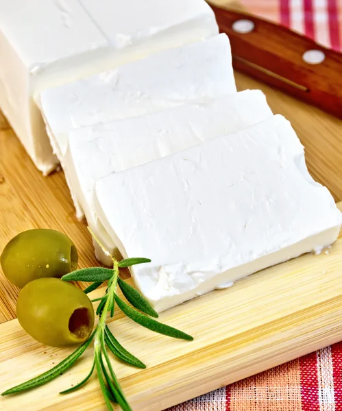 Feta with olives on a red fabric — Stock Photo, Image