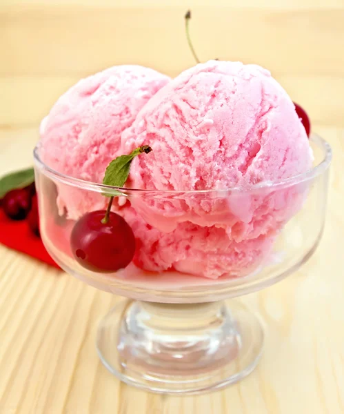 Ice cream cherry with red napkin on board — Stock Photo, Image