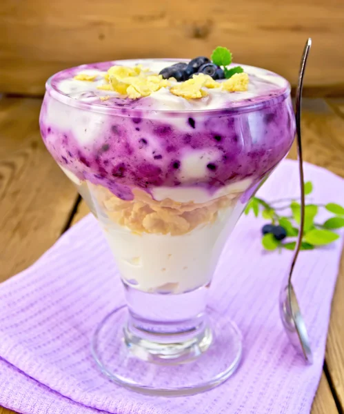 Dessert milk with blueberries on napkin — Stock Photo, Image