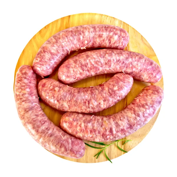 Würstchen Schweinefleisch mit Rosmarin auf rundem Brett — Stockfoto