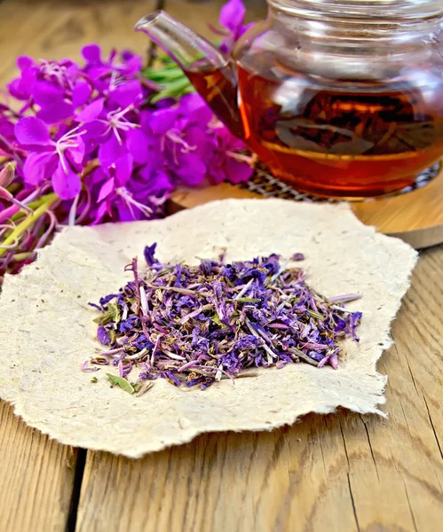 Fireweed dry with teapot on board — Stock Photo, Image