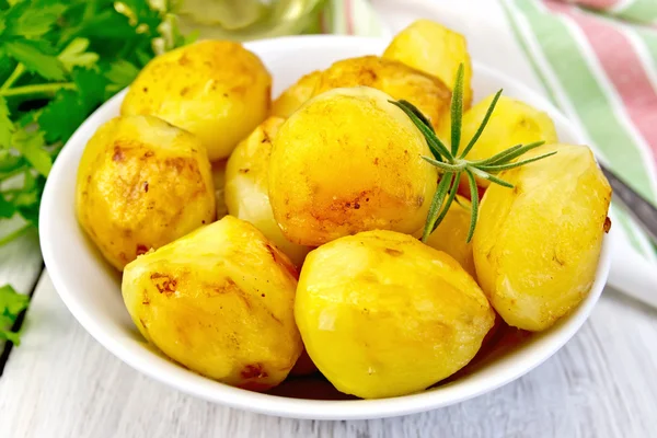 Potatoes fried in plate on light board — Stock Photo, Image