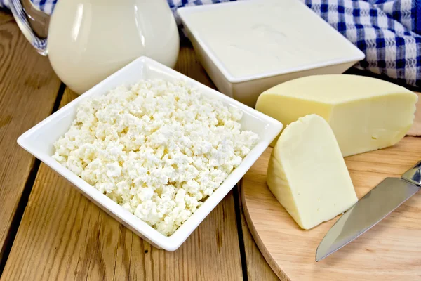 Curd with cheese and napkin on board — Stock Photo, Image