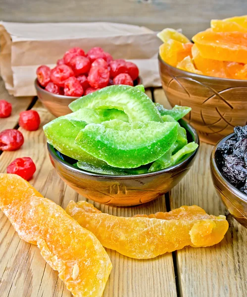 Candied pomelo and fruit in bowl on board — Stock Photo, Image