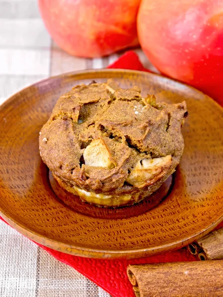 Cupcake rye with apples in plate on tablecloth — Stock Photo, Image