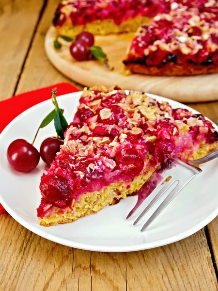 Pie cherry with red napkin on board — Stock Photo, Image