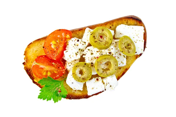 Sandwich with feta cheese and olives on top — Stock Photo, Image