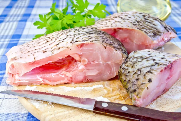 Bream raw with parsley on fabric — Stock Photo, Image