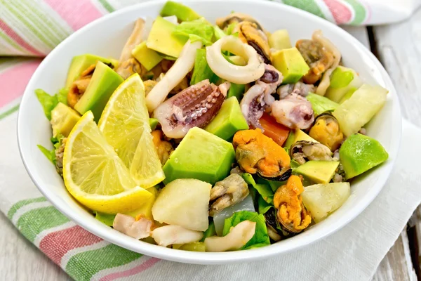 Salad seafood and avocado on linen napkin — Stock Photo, Image
