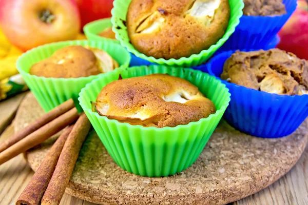 Cupcake and rye with apples on board — Stock Photo, Image