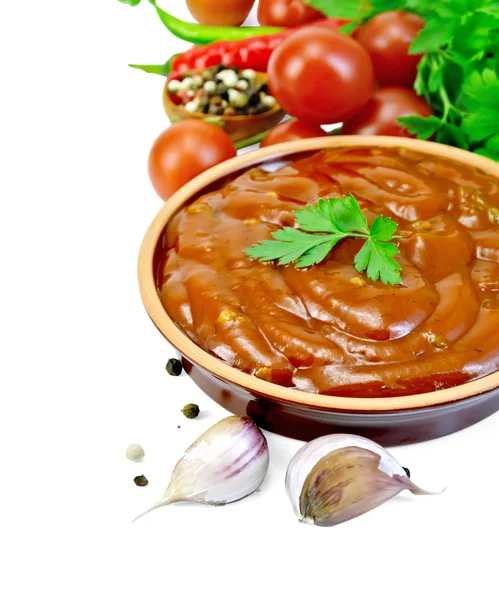 Ketchup in pottery with vegetables and spices — Stock Photo, Image