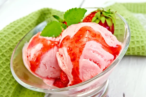 Ice cream strawberry with syrup in glass on board — Stock Photo, Image