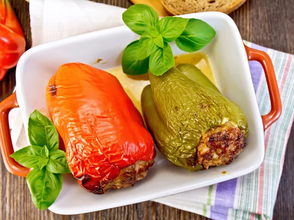 Pepper stuffed meat in brown roaster top — Stock Photo, Image