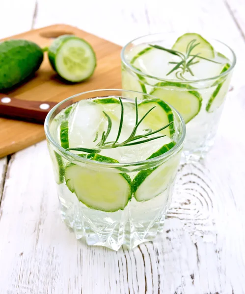 Lemonade with cucumber and rosemary in two glassful on white boa — Stockfoto