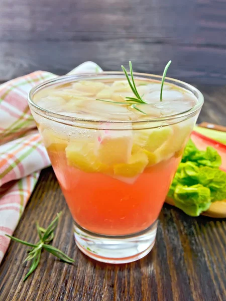 Lemonade with rhubarb and rosemary on board — Stockfoto