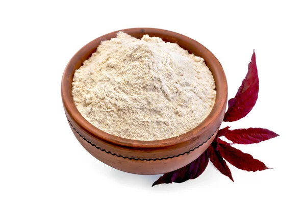 Flour amaranth in clay bowl with a flower — Stock Photo, Image