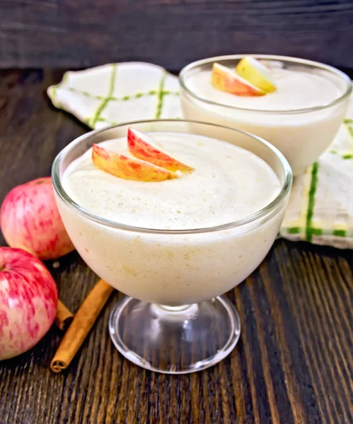 Jelly airy apple in glass bowl on dark board — Stock Photo, Image