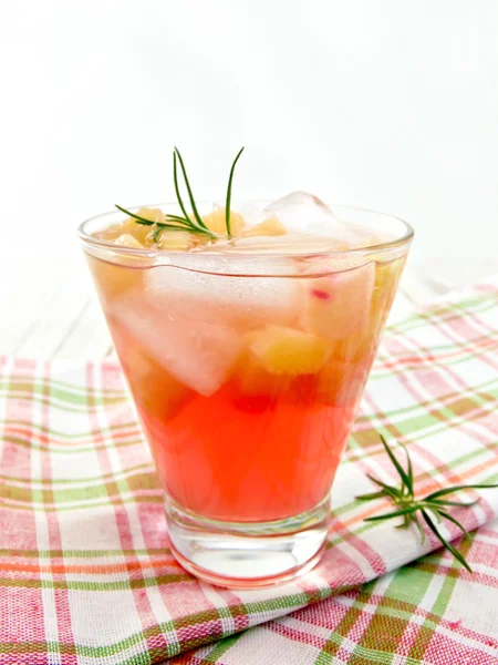 Lemonade with rhubarb and rosemary on checkered napkin — 图库照片