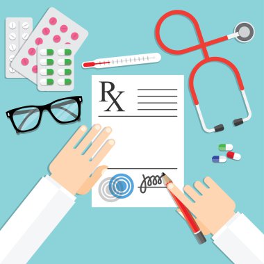 Doktor reçete defterini üzerinde notlar yazma