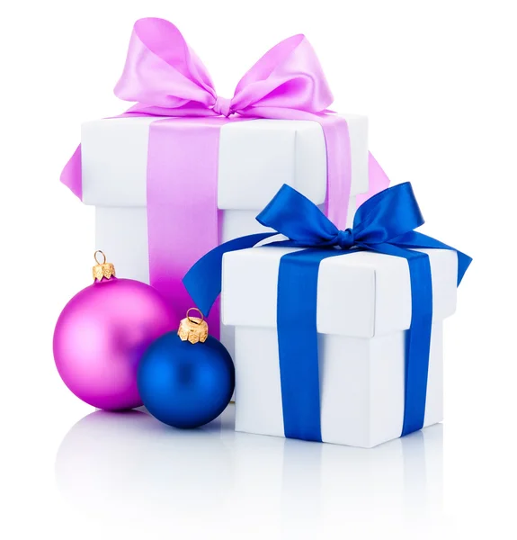 Two white boxs tied red and pink ribbon bow and christmas balls — Stock Photo, Image