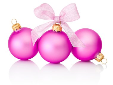 Three pink christmas balls with ribbon bow Isolated on white bac clipart