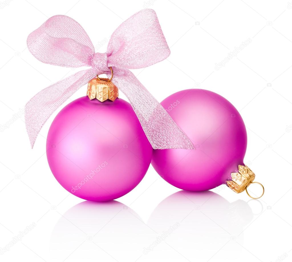 Two pink Christmas baubles with ribbon bow Isolated on white bac