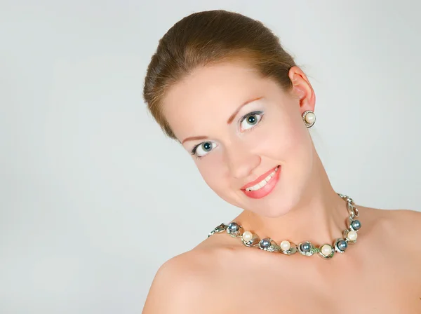 Girl with a pearl necklace — Stock Photo, Image