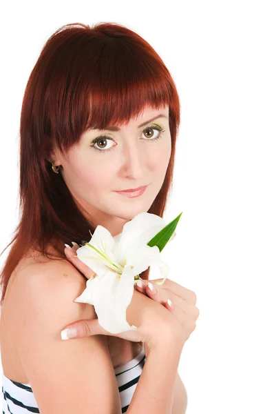 Het meisje met een lily bloem — Stockfoto