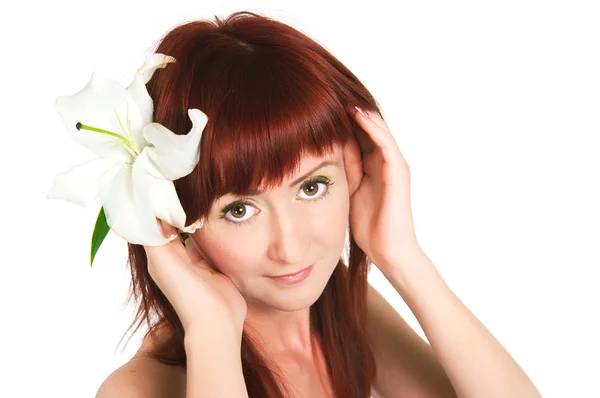 La ragazza con un fiore di giglio — Foto Stock