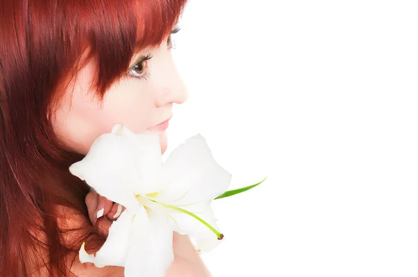 The girl with a lily flower — Stock Photo, Image