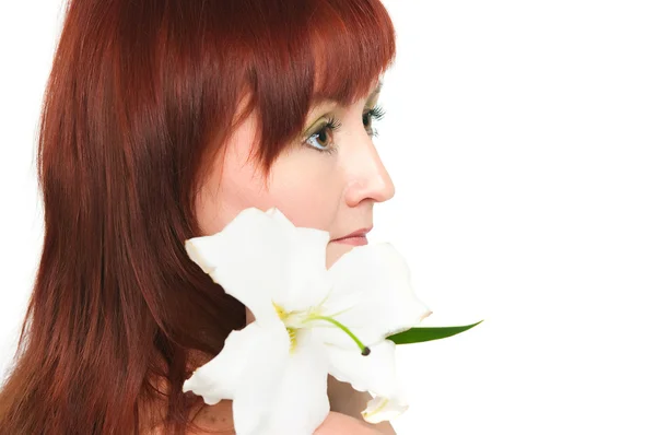 The girl with a lily flower — Stock Photo, Image