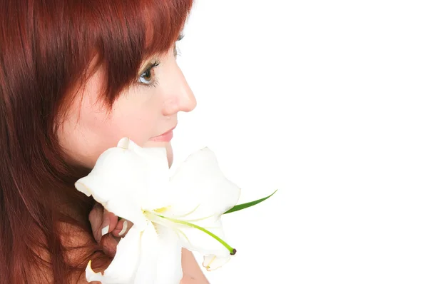 The girl with a lily flower — Stock Photo, Image