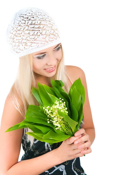 Fille blonde avec un bouquet de lis de la vallée — Photo