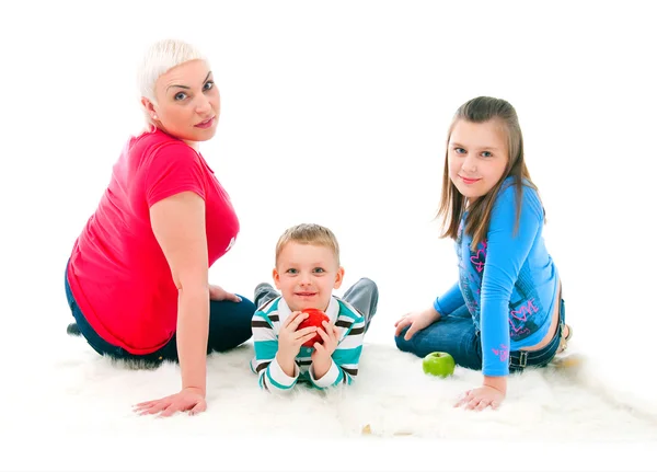 Young mother with two children — Stockfoto