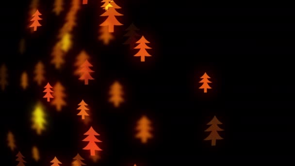 Slow motion of the blurred and glowing small christmas trees — Stock Video