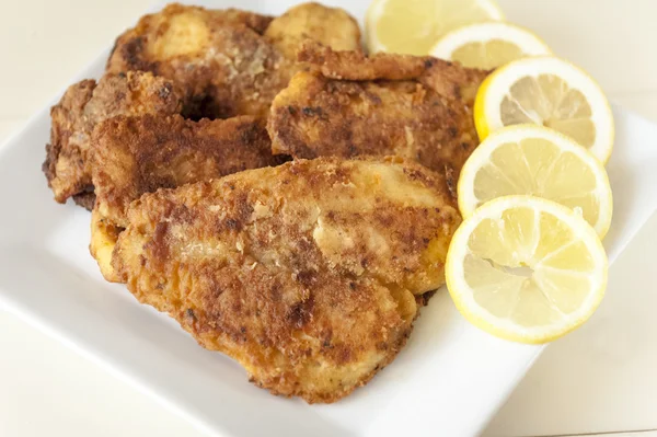 Fried fish and lemon — Stock Photo, Image