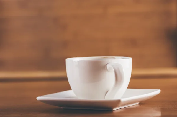 Cup på ett bord — Stockfoto