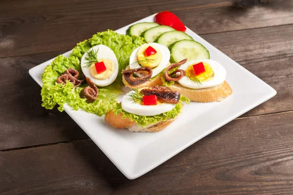 Crostini with anchovy — Stock Photo, Image