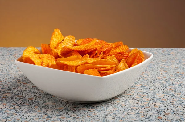 Potato chips bowl on table — Stock Photo, Image
