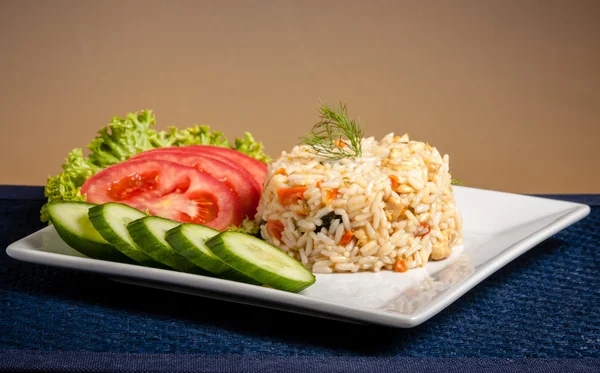 Rice on white plate — Stock Photo, Image