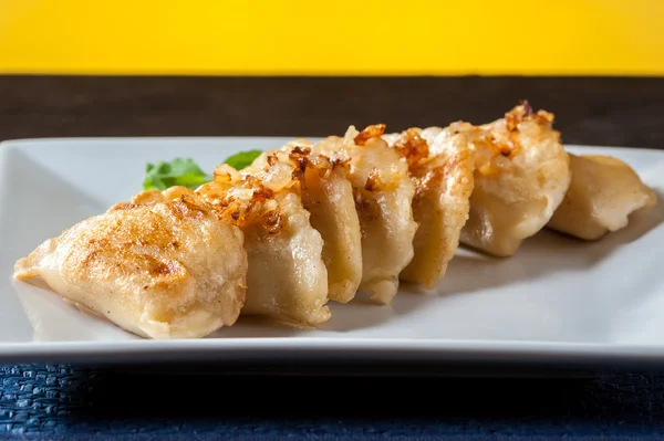 Dish with dumplings — Stock Photo, Image