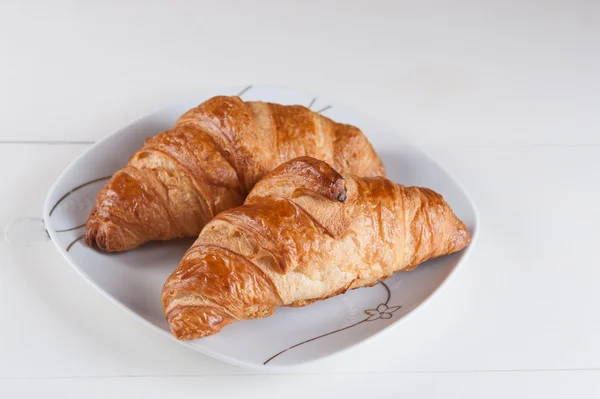 Croissanter ljus och god frukost — Stockfoto