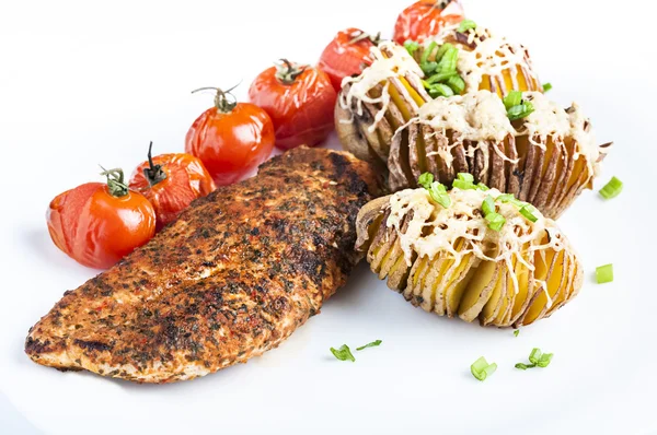 Baked potatoes with grilled chicken — Stock Photo, Image